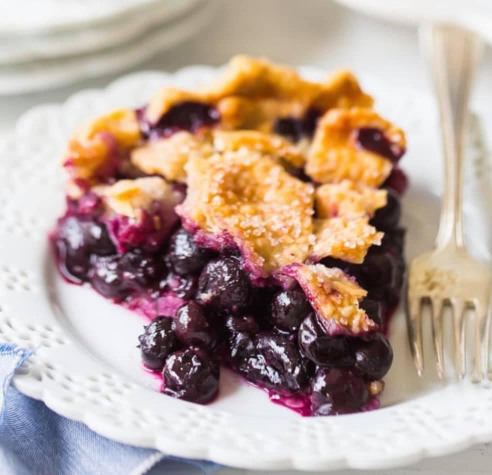 A slice of blueberry pie