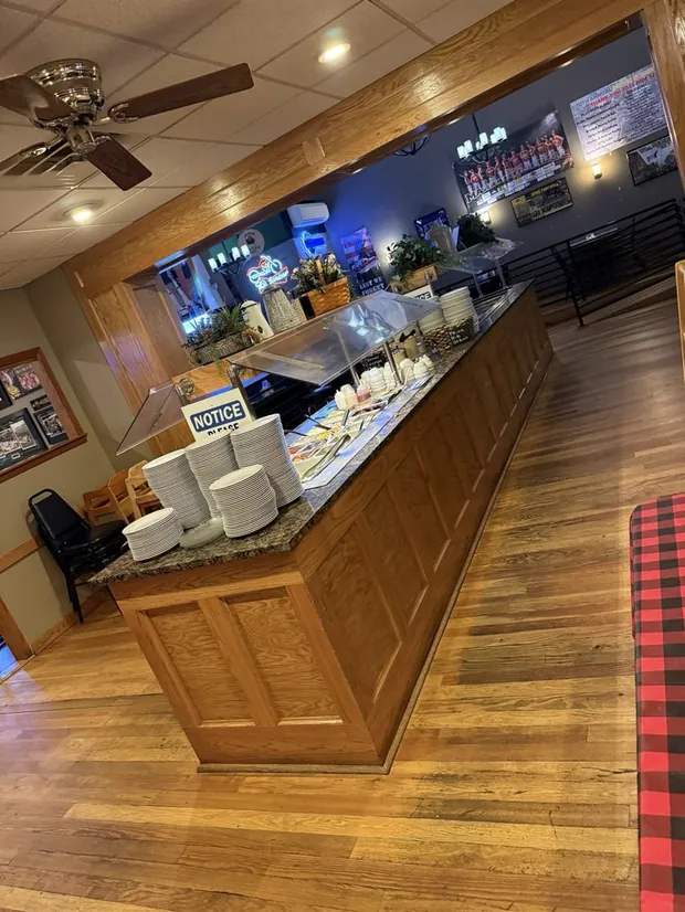 The buffet room at Sally's with plates stacked ready