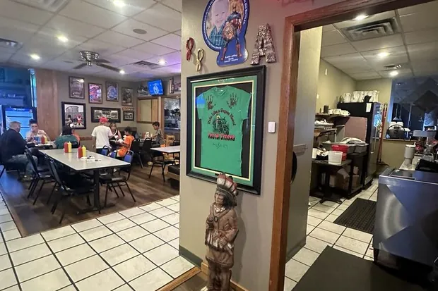 The dining room at Sally's with guests at the tables